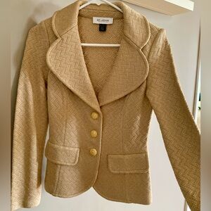 Fitted St. John gold blazer with gold buttons Size 2. Sewn in shoulder pads.